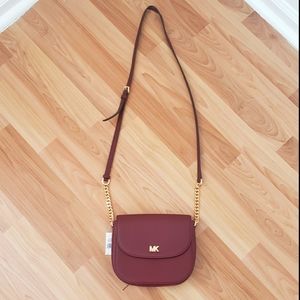 Michael Kors half dome crossbody leather bag